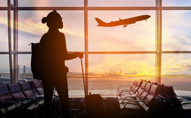 silhouette of person at airport
